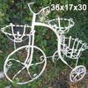 Tricycle planter.  Priced 40.00 each.  