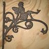 Cute cast iron Fairy plant hangers, wall mount.  10.00 each.