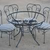 Nice heavy iron patio sets, four chairs and glass top table, priced 250.00 set.  