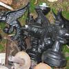 10 foot tall light post with gargoyles.  Pictures are of it laying on its side.   Priced 695.00.   