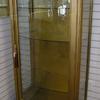 Gorgeous lighted show case with old wavy curved glass door and glass shelves.   Priced 595.00.    